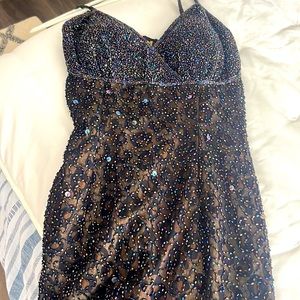 Heavily beaded dress with leopard print lining